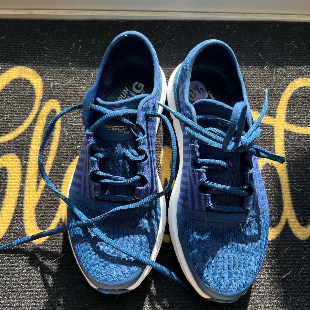 Blue cushion soled Under Armour sneakers. Hardly worn.